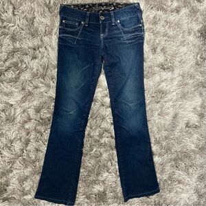 Guess women blue denim, front & black pockets,boot cut jeans. Size 25. Used.